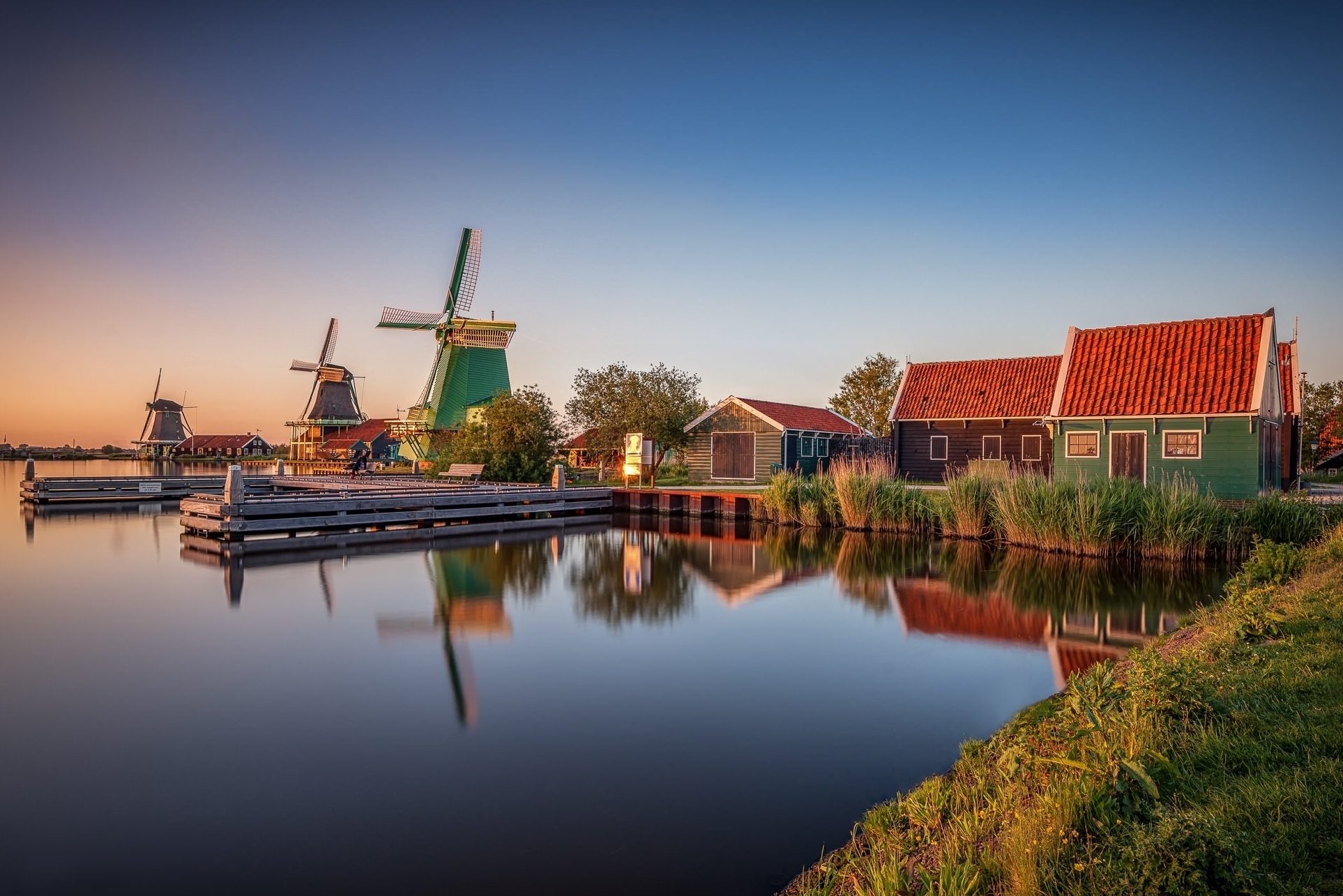Wonderful pics of windmills surrounded by tulips fields - Zaandam | Secret World Trip Planner