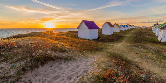Gouville-sur-Mer and the charming beach huts - Gouville-sur-Mer | Secret World Trip Planner