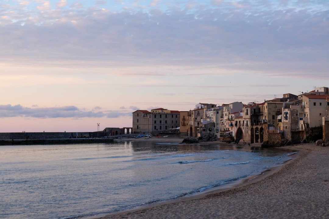 Cefalù: Sunset on the beach - Secret World - 90015 Cefalù PA | Secret World Trip Planner