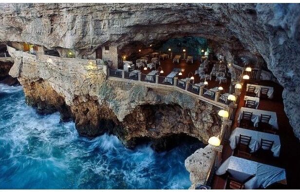 Italy:The Cliff Restaurant (grotta Palazzese) - Polignano A Mare | Secret World Trip Planner