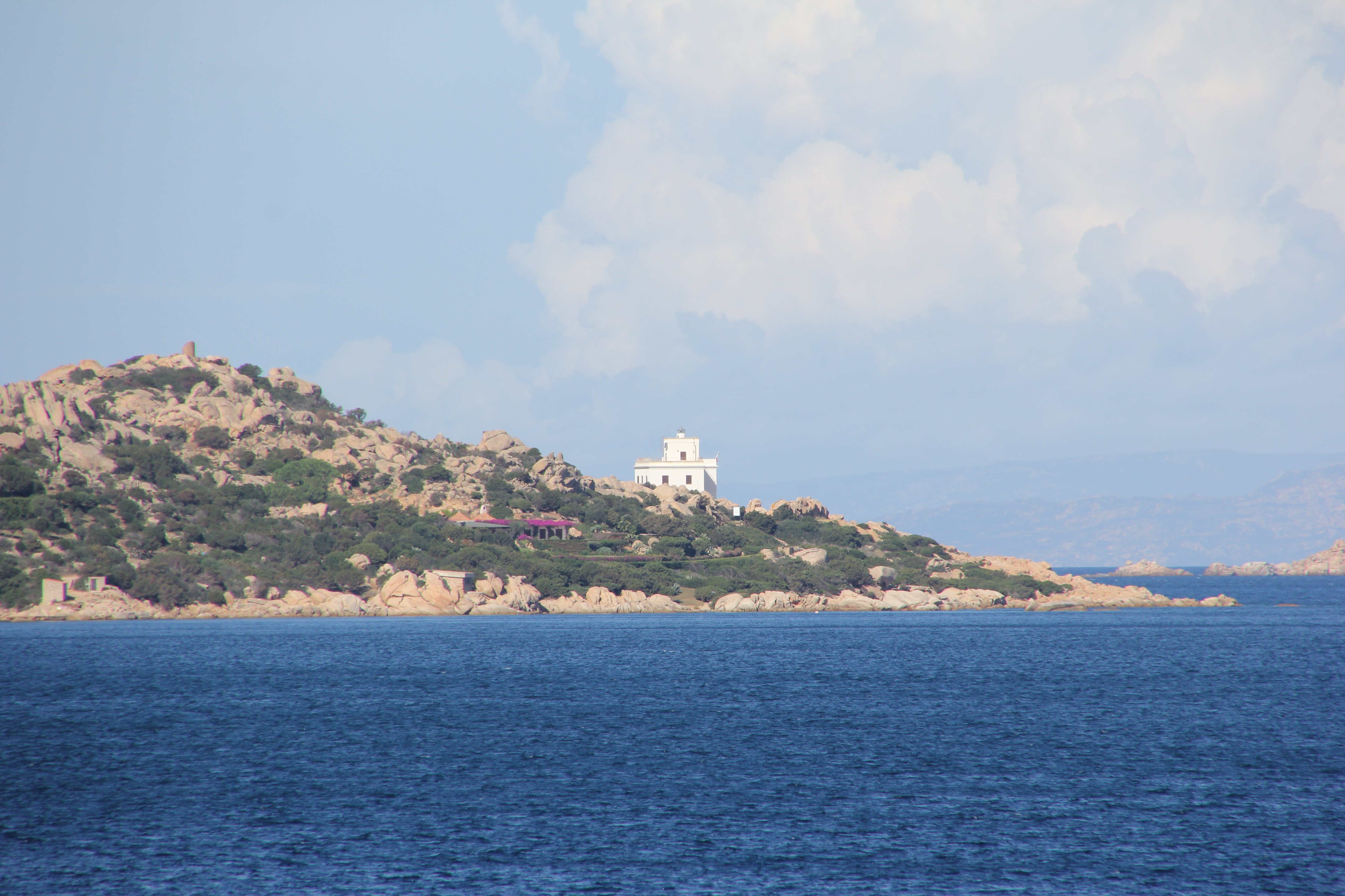 Sardinia | Lighthouse of Punta Sardegna - Faro di Punta Sardegna | Secret World Trip Planner