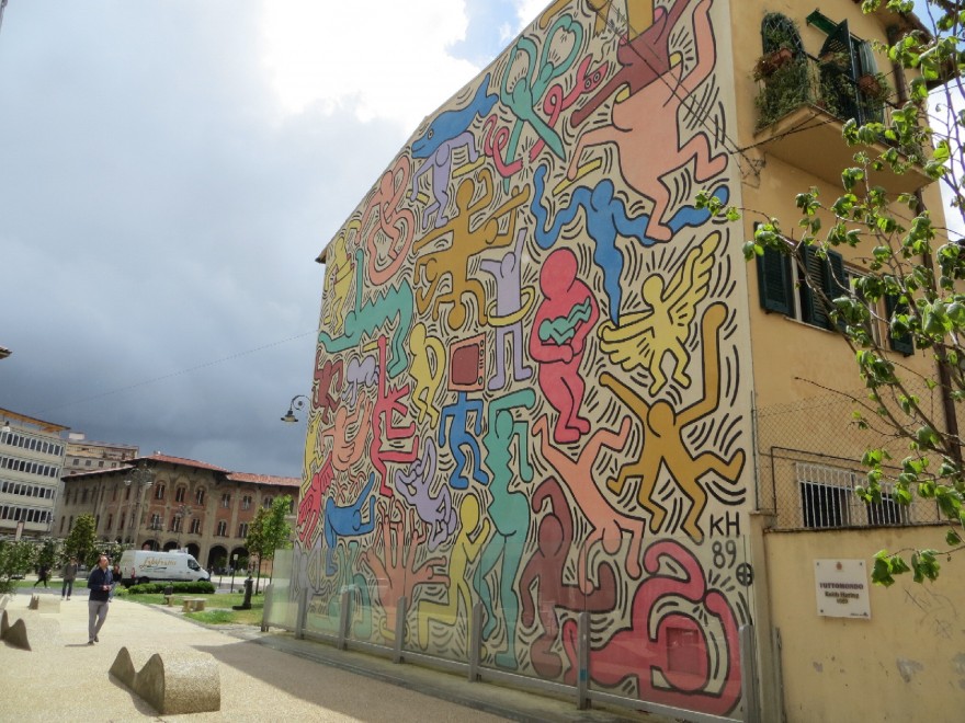 Tuttomondo een muurschildering van Keith Haring - Pisa | Secret World Trip Planner