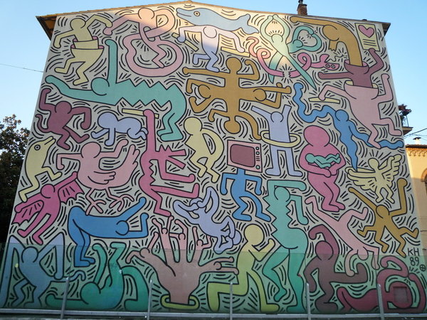 Tuttomondo een muurschildering van Keith Haring - Pisa | Secret World Trip Planner