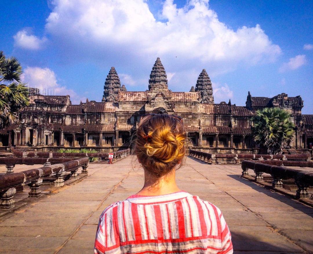 Angkor Wat at Dawn: Towers in Mist and Reflections - Wat Po | Secret World Trip Planner