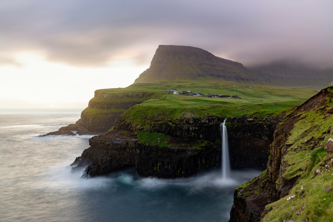 Gásadalur: Sunset Over the Faroe Waterfall - 4H47+CXP | Secret World Trip Planner