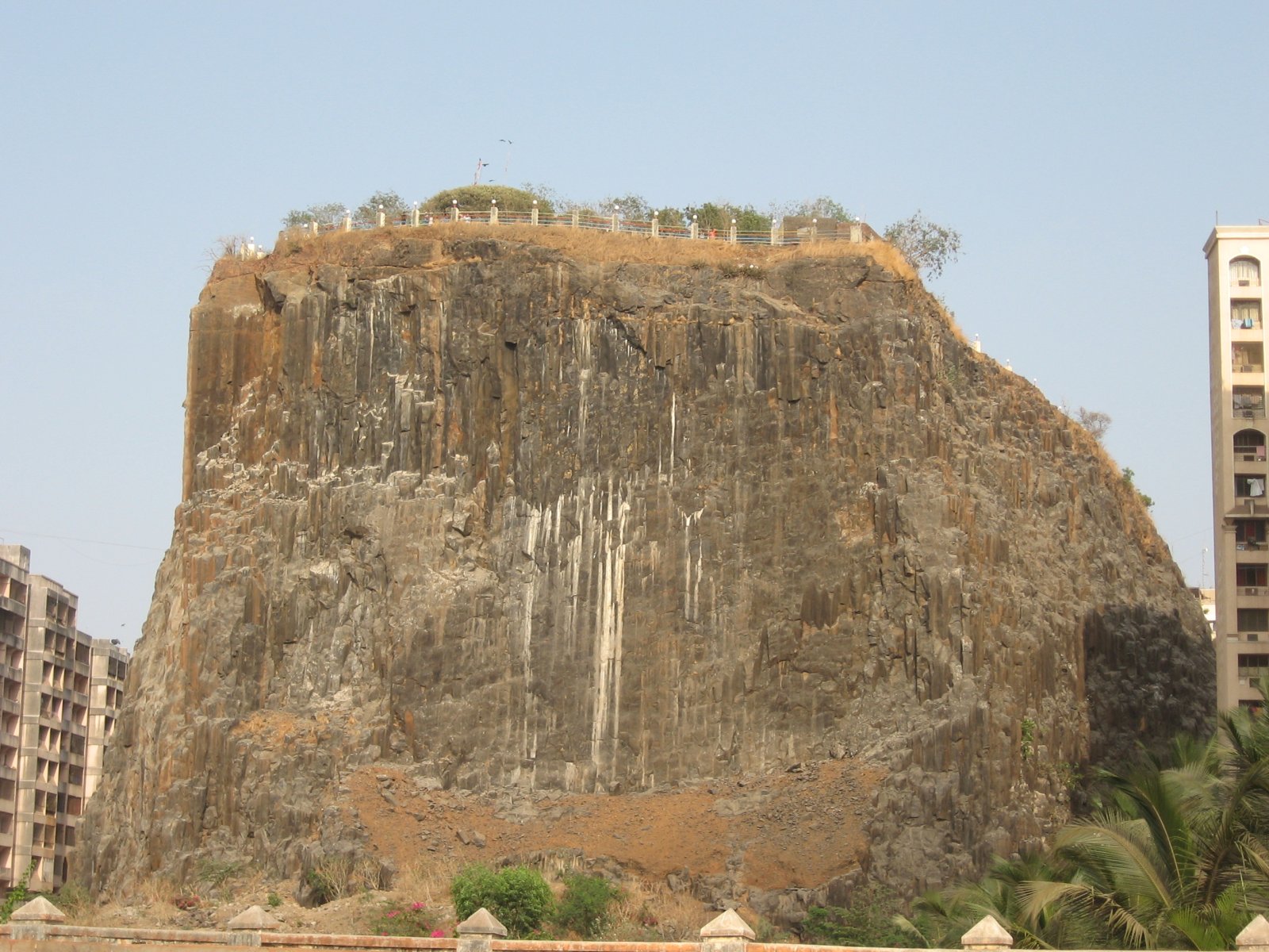 Imagine a huge rock of solid lava: Gilbert Hill - Mumbai | Secret World Trip Planner