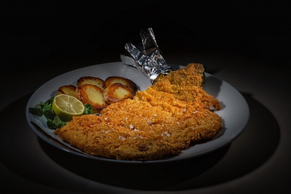 The cotoletta alla milanese is the most famous and typical dish of Milan - Milano | Secret World Trip Planner