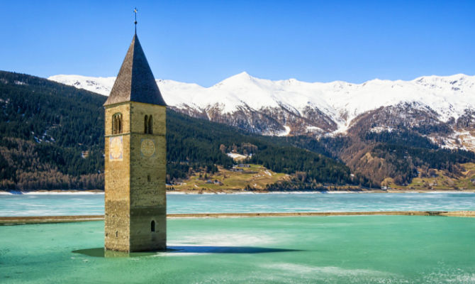 Lake Resia Klokkentoren - Resia | Secret World Trip Planner