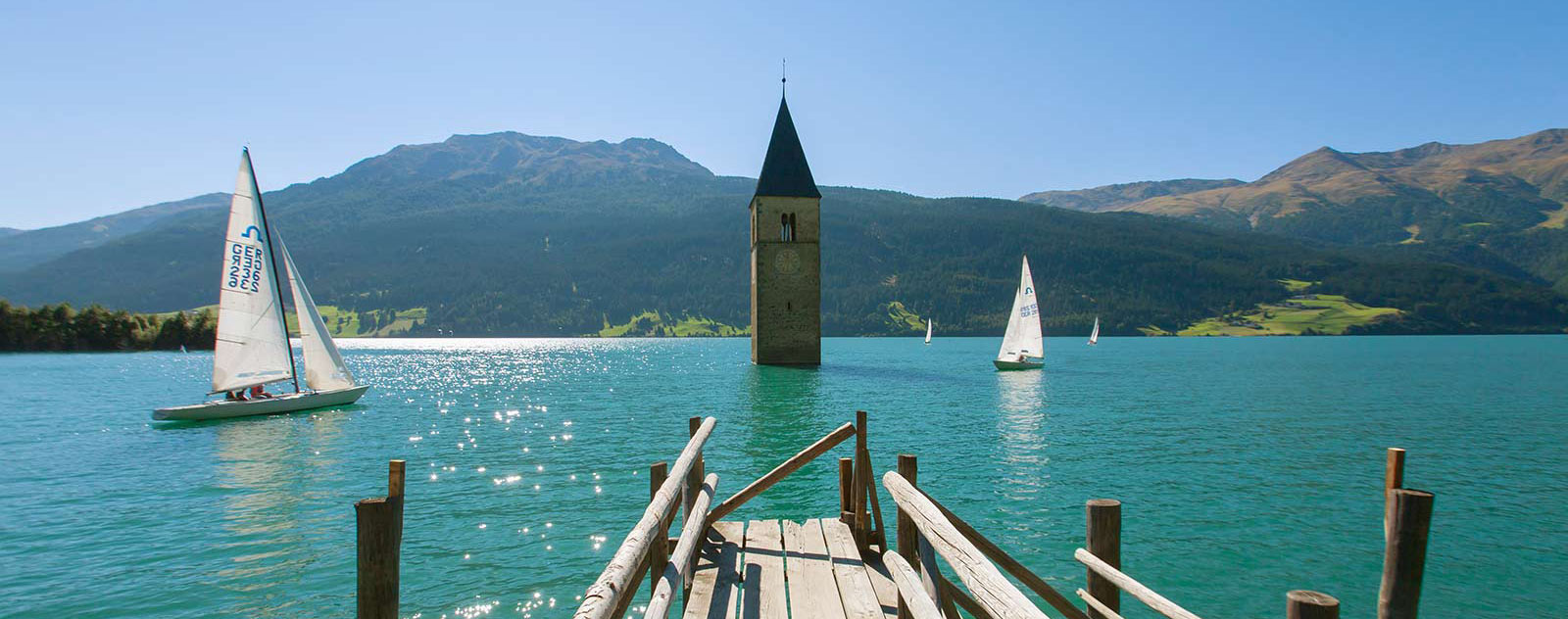 Lake Resia Klokkentoren - Resia | Secret World Trip Planner